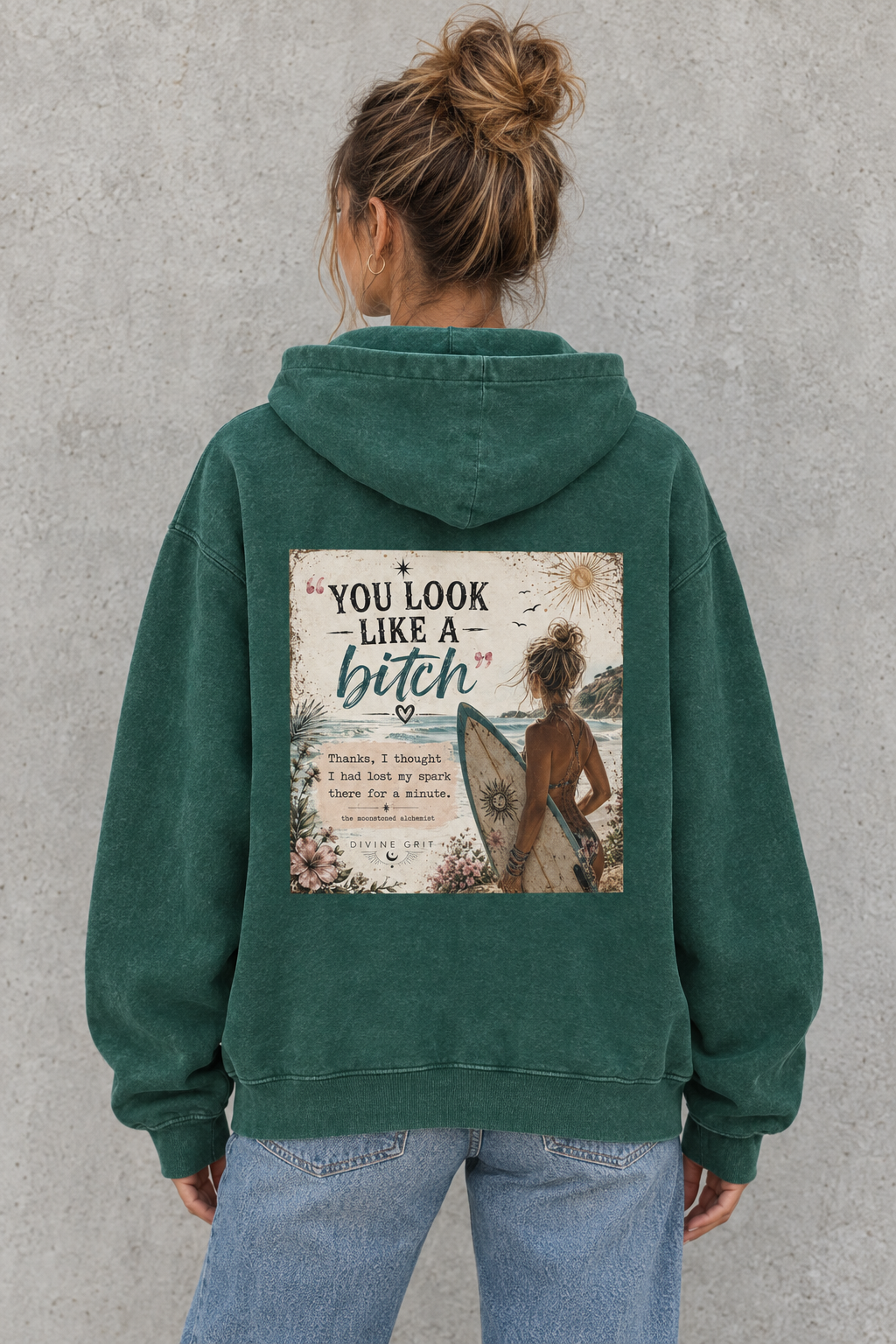 AI-generated back-view mockup of a woman wearing the Green washed hoodie with You Look Like a Bitch coastal surf artwork.