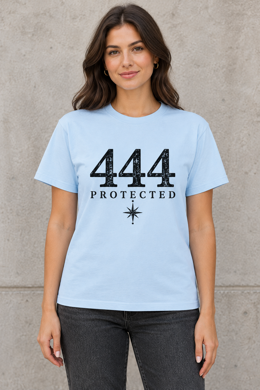 AI-generated mockup of a woman wearing the Sky Blue 444 Protected graphic T-shirt with the front design visible.