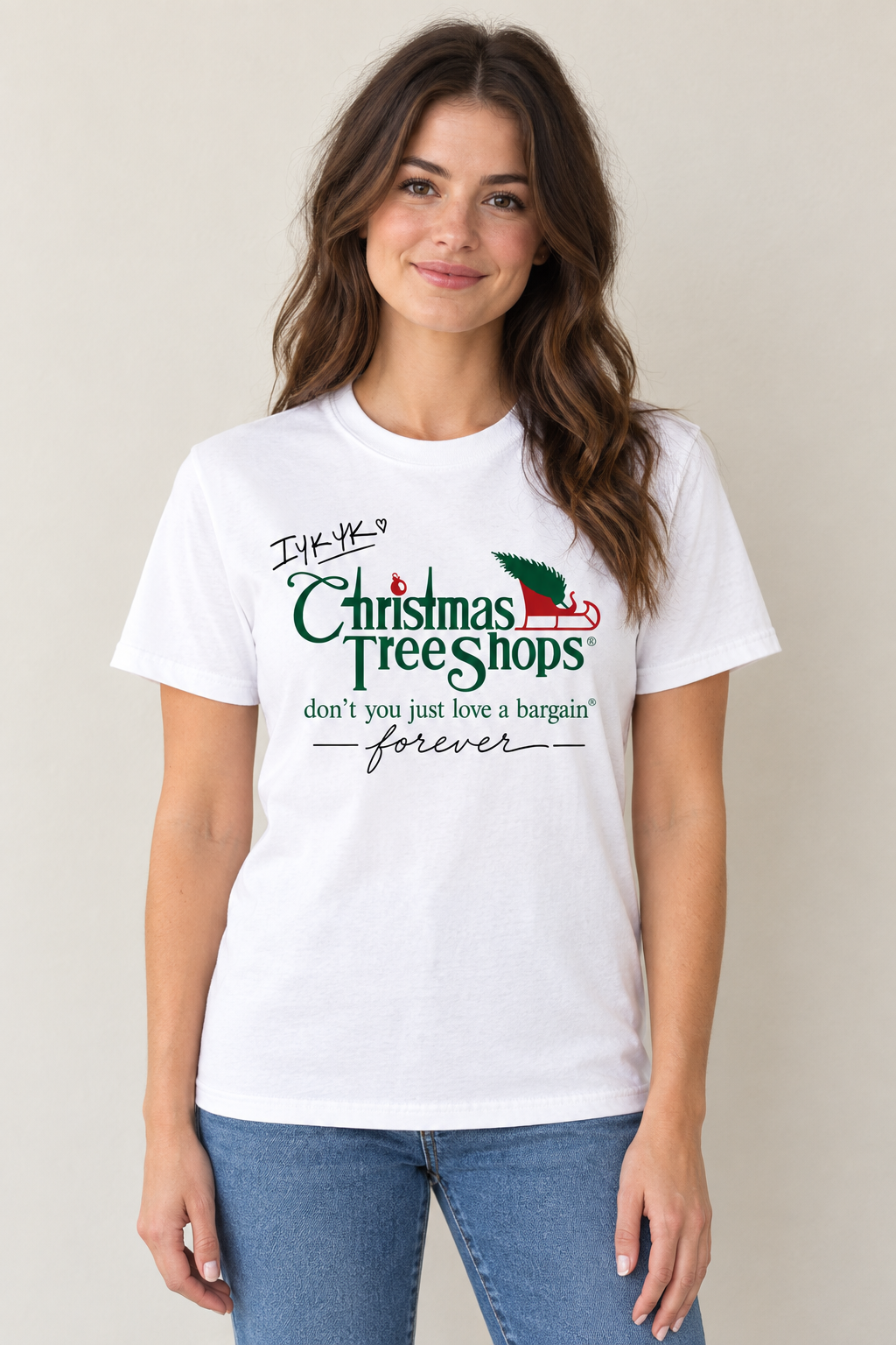 AI-generated mockup of a woman wearing the White IYKYK Christmas Tree Shops nostalgia graphic cotton T-shirt.