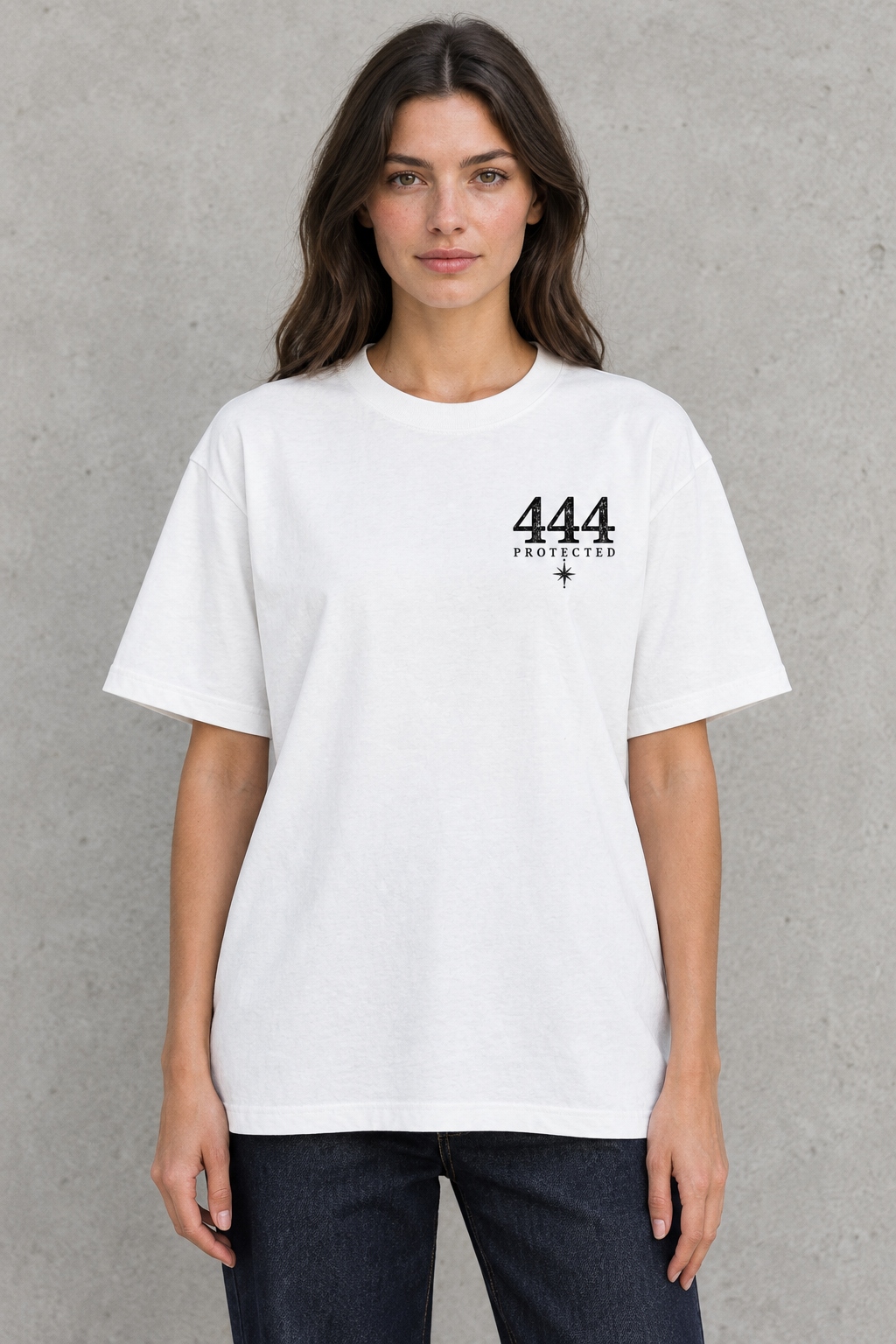 AI-generated mockup of a woman wearing the white loose-fit tee, showing the small 444 Protected chest print.