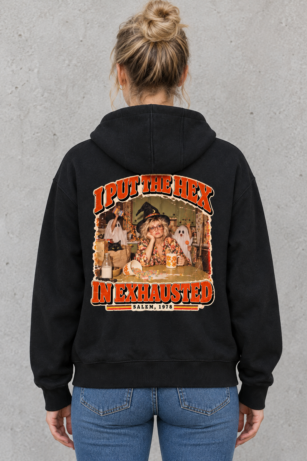 AI-generated mockup of a woman showing the I Put the Hex in Exhausted back print on the Black zip-up hoodie.