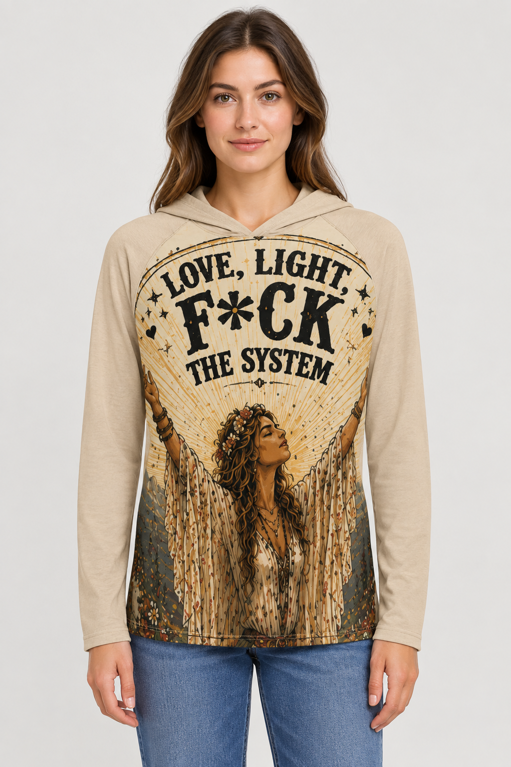 AI-generated mockup of a woman wearing a beige Love Light F*ck the System hooded shirt with an illustrated flower-crowned woman and blue jeans.