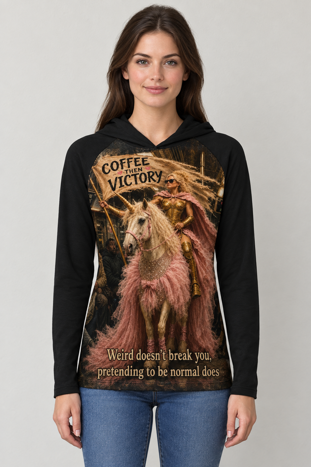 AI-generated mockup of a woman wearing a black Coffee Then Victory hooded shirt with armored-woman and unicorn artwork and blue jeans.