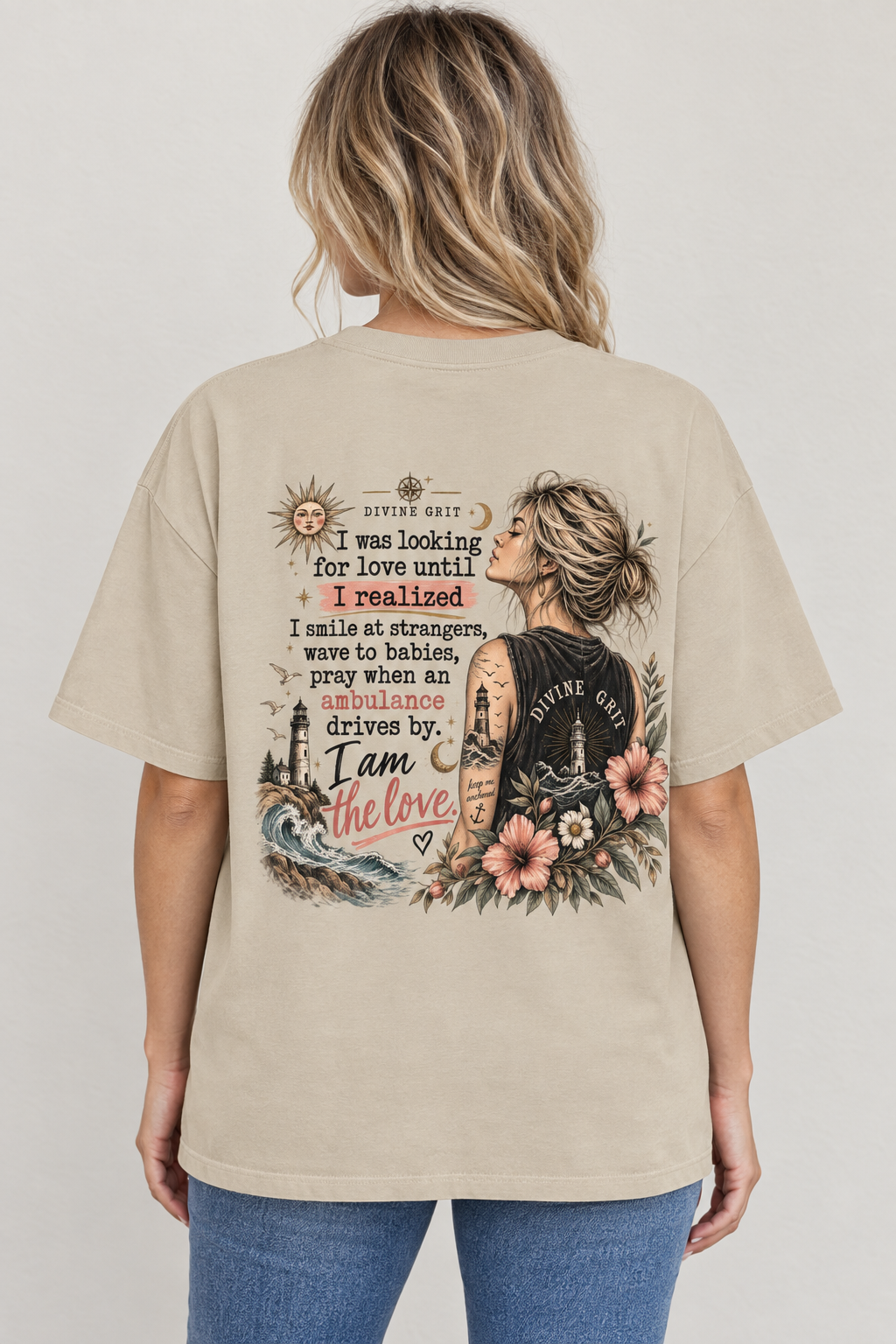 AI-generated back-view mockup of a woman wearing a beige oversized I Am the Love graphic T-shirt with coastal floral artwork and a kindness quote.