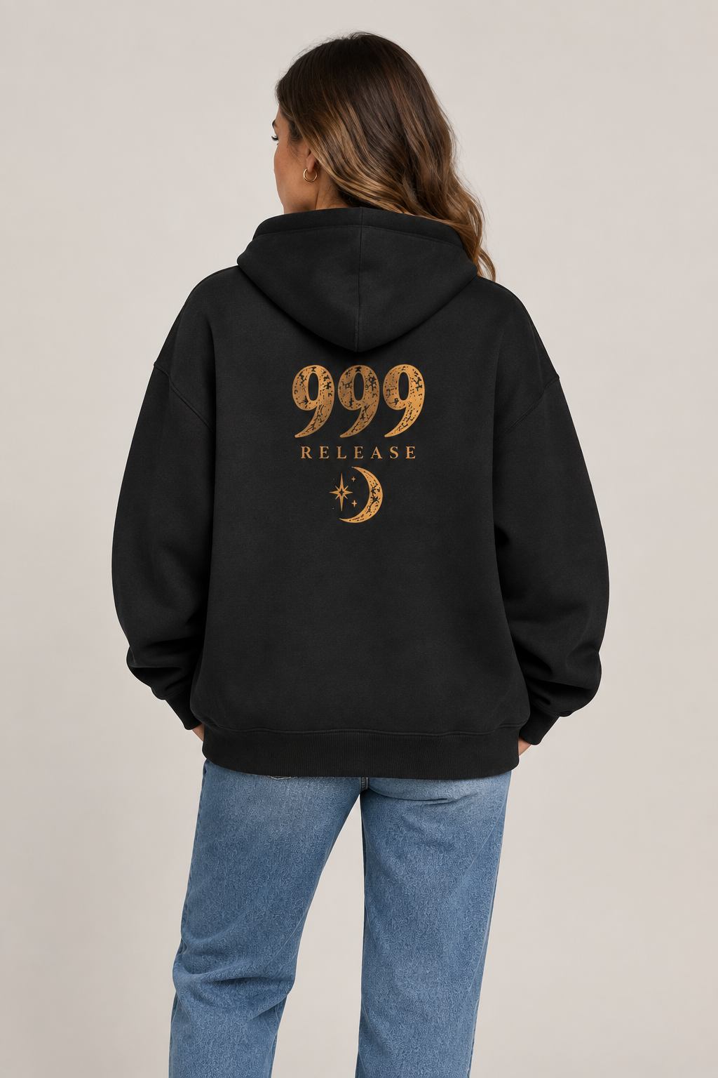 Woman-model back-view mockup of the 999 Release hoodie